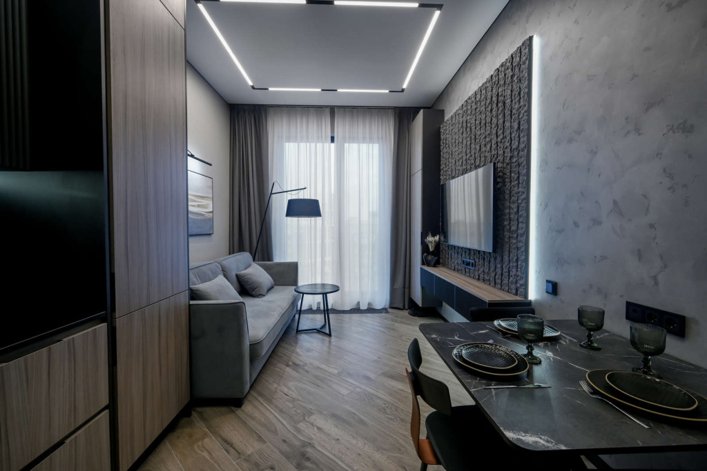 Черно-серая квартира для солидного холостяка - фото №2